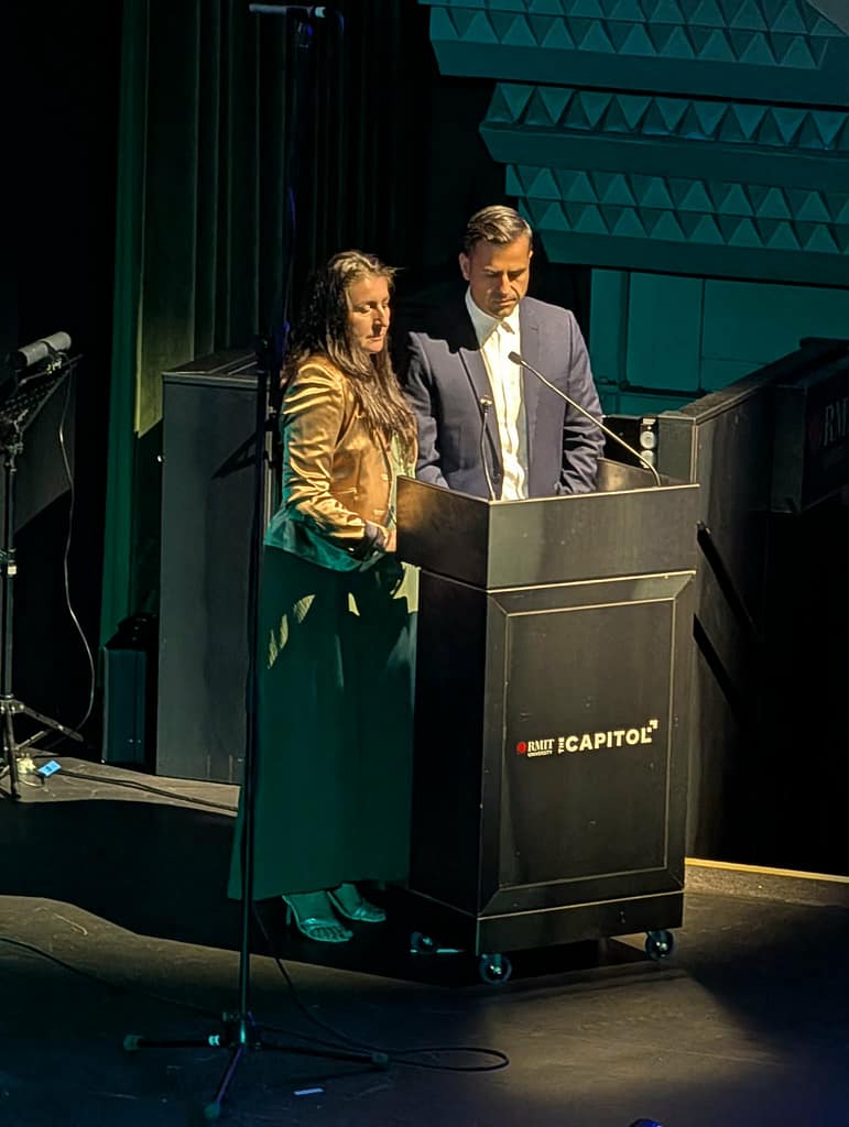 Katerina Poutahidou and Jeremy Artis recite the Hymn of Freedom